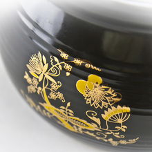 探索益精陶瓷煲K018 黑色貼金花設(shè)計(jì)與實(shí)用性兼?zhèn)涞膹N房好幫手